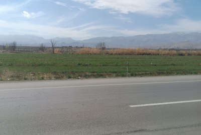 زمین زراعی ۲۶۷۰ متر بر جاده بین المللی مابین روستای خلج و سه راهی بلجک