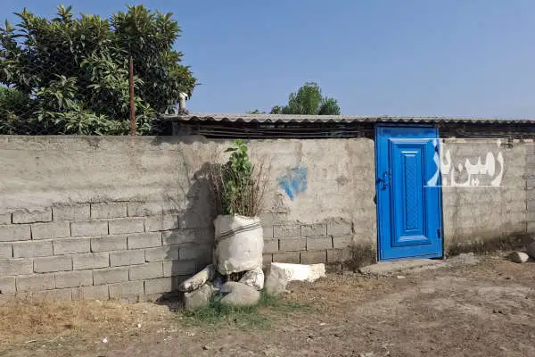 زمین ۵۶۰ متری دیوار کشیده و فنس و درب دارد - تصویر 3