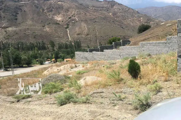 زمین بدون بنا مسکونی دو بر ۱۹۰ متر روبه روی روستای سرخ آباد - تصویر 1