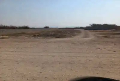 زمین کشاورزی پشت مسکن ملی نزدیک آب و برق گاز
