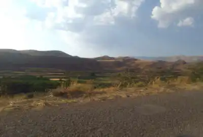 زمین دیمی برجاده رازمیان روستای محمداباد ۱۵۰۰ متر