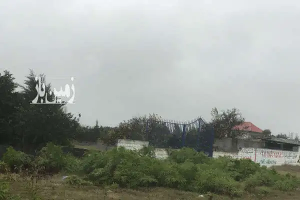 زمین باغی به مساحت ۴۵۰ متر دیوار کشی شده داخل شهرک - تصویر 1