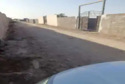 زمین باغی چهار دیواری با درب بزرگ ماشین رو وهن آباد ۶۰۰ متر