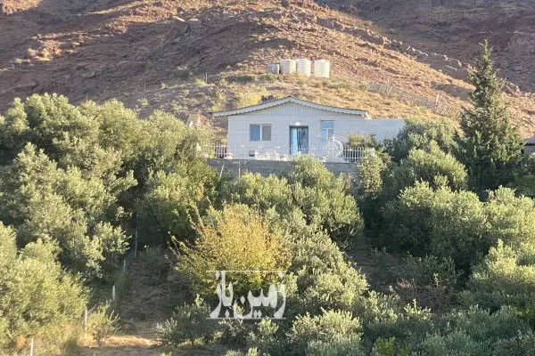 فروش خونه باغ ۵ هزار متر داراي بنا ٧٠ متري با جواز ساخت - تصویر 2