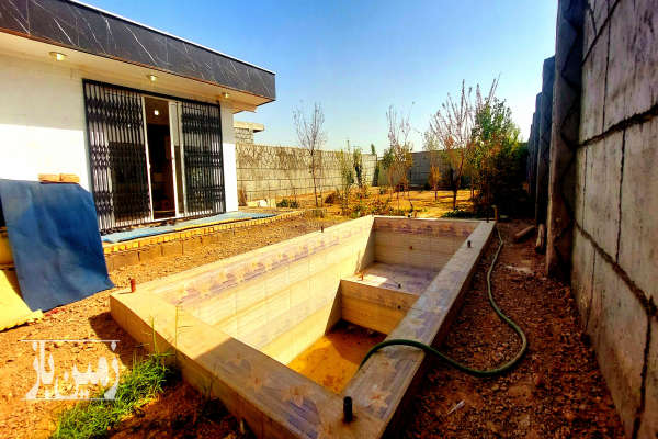 باغ همراه خونه با درختانِ ۵ ساله ۵۷۵ متر دستجا-2