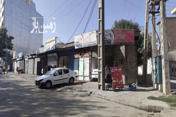 مزایده فروش زمین گاراژ بزرگ دوبر ۱۲۹۵ متر-1