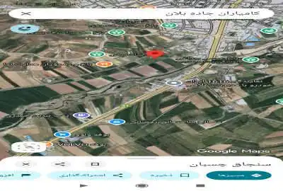 زمین در محدوده ی کامیاران روی جاده بلان