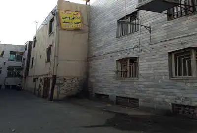 فروش زمین همراه ساختمان سه طبقه کلنگی نزدیک باغ سپهسالار