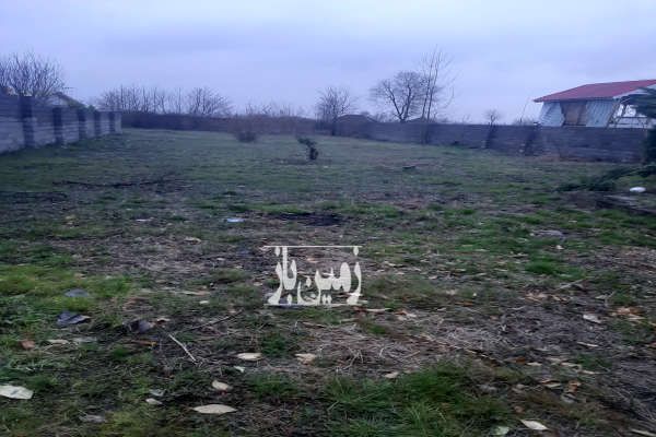 زمین به متراژ۱۲۶۰متر واقع در روستای ملاسرا بر اول جاده-1